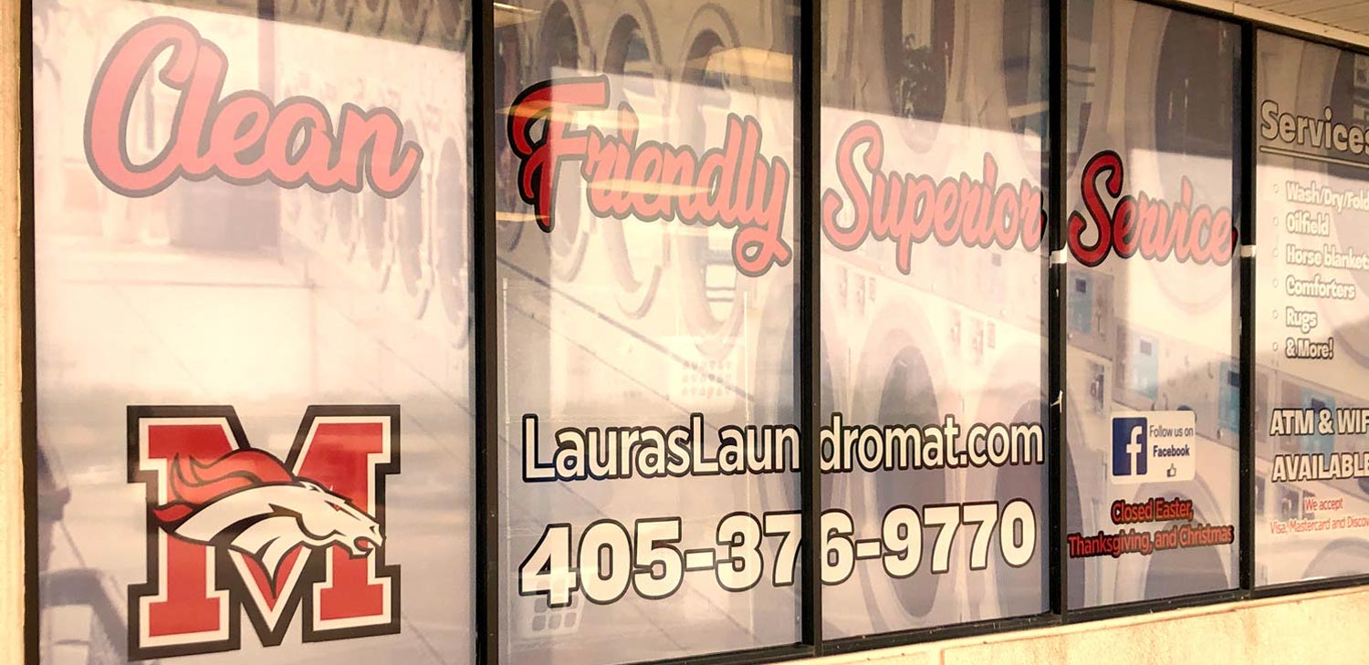 Exterior windows with the shop graphics